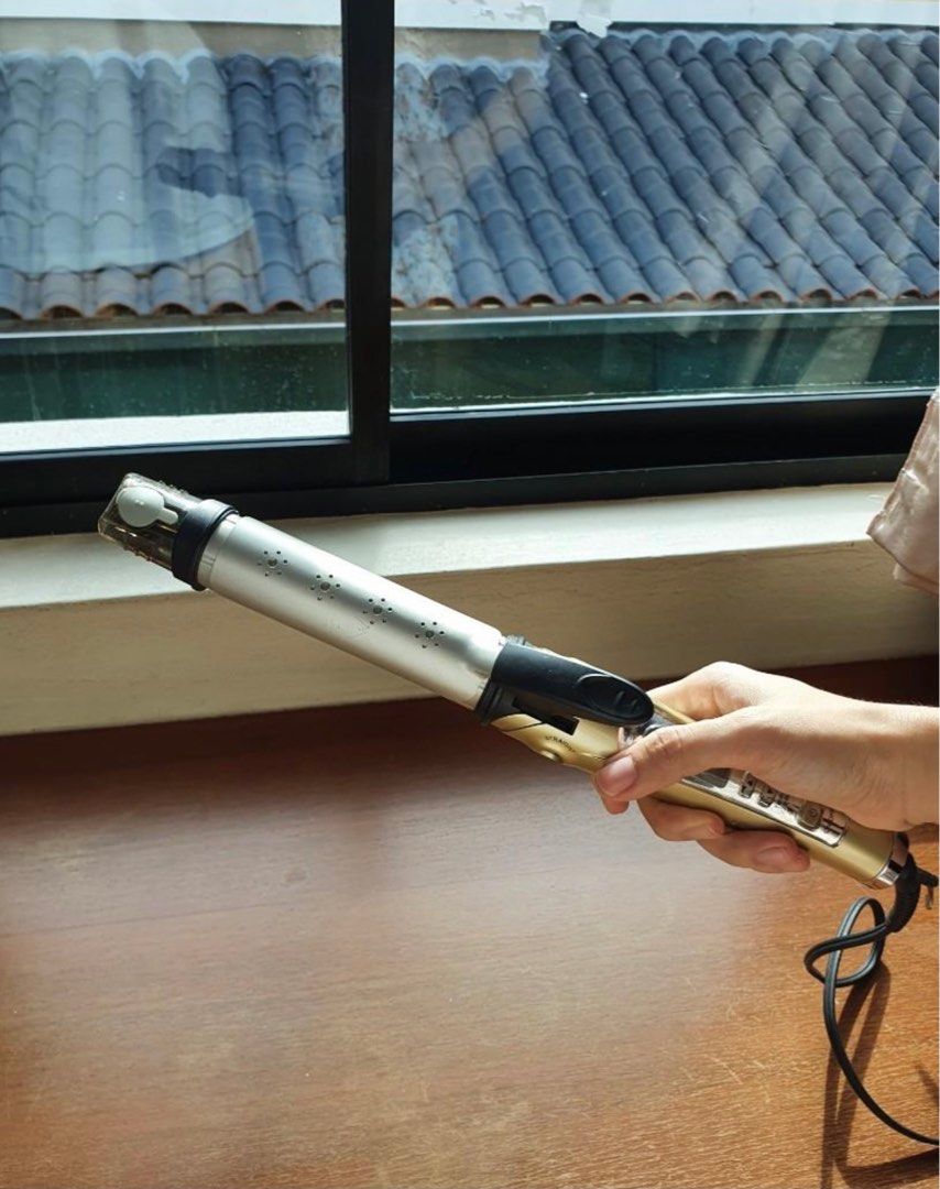 Tesco s 2 way straighter and curler iron