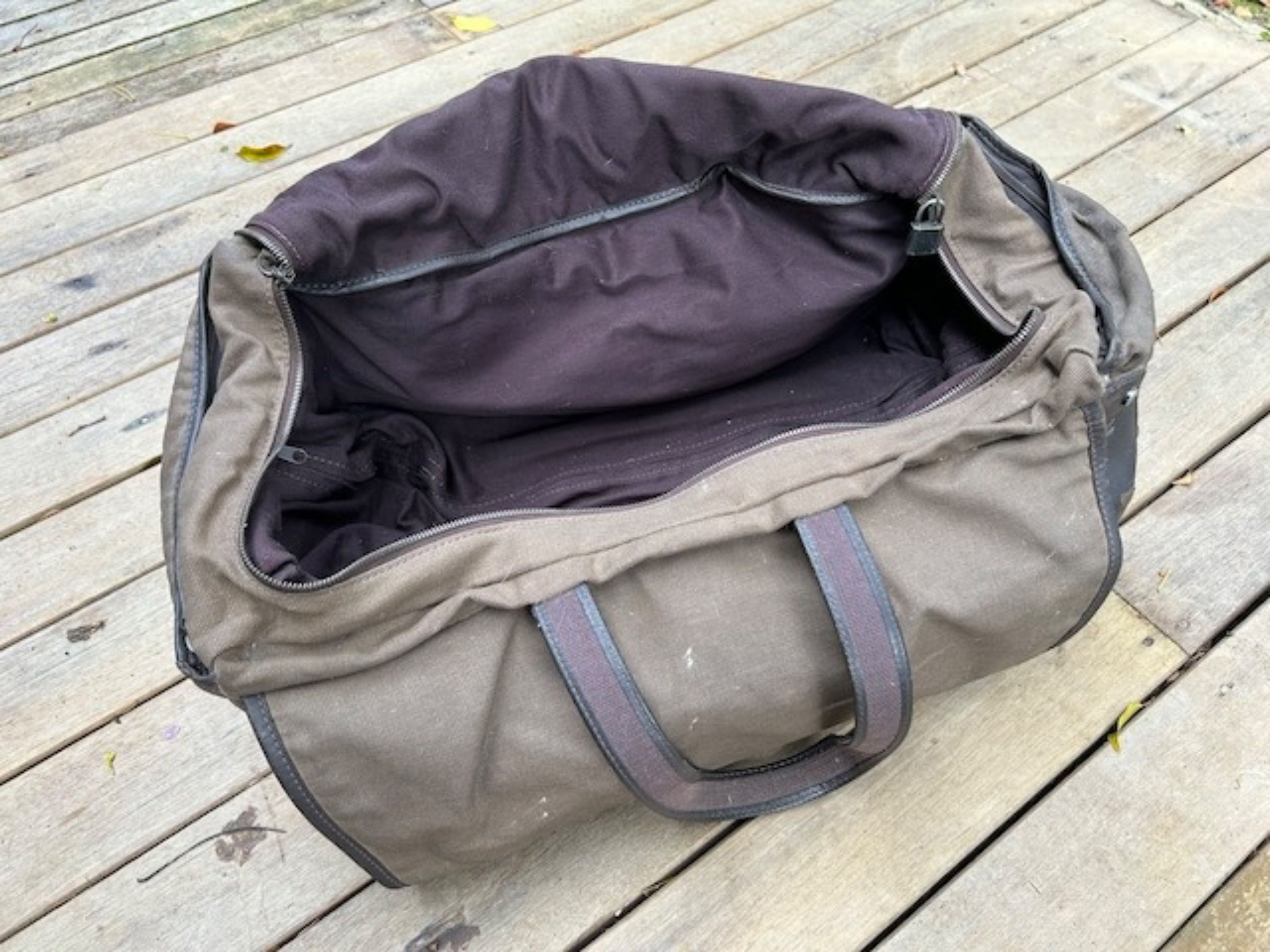Updated price - Trolley Dunhill bag, travel luggage (Category: Bags & Wallets) located in Singapore. Submitted by y.delhaye (Listing ID 1293987716, Image 2). Description: Travel in style ! 55 cm x 35 cm x 30 cm Ideal dimensions for planes Made from woven cotton with calfskin leather trim and polished hardware. Features generous internal space and who hop handles. Orange rain protection cover Needs a little bit of cleaning and dusting Made in Ital
