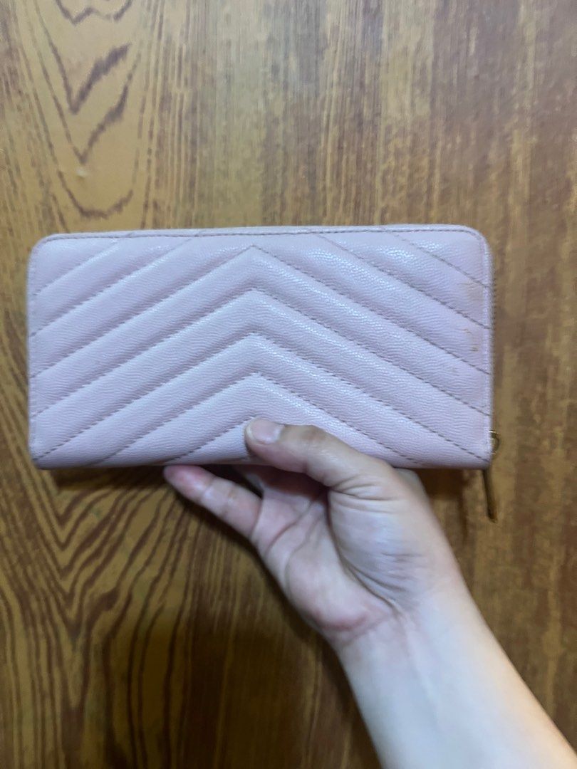 YSL wallet (Category: Luxury Bags & Wallets) located in Valenzuela. Submitted by dianzskiyo (Listing ID 1293973206, Image 2). Description: 📍 SELF- AUTHENTICATION IS ADVISED📍 Selling Ysl continental wallet (Preloved) 🌸 Light pink in color 🌸 signs of usage (minimal dirt which is barely noticeable) 🌸 Brass gold pa ang hardwares 🌸 saint laurent paris underzip (with $ sign) - still self authentication needed 🌸 Last pic for reference only 🌸 Col