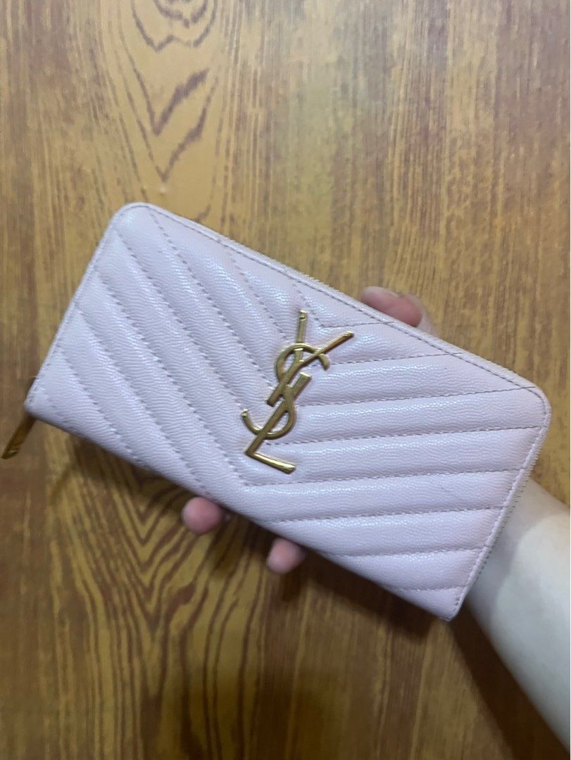 YSL wallet (Category: Luxury Bags & Wallets) located in Valenzuela. Submitted by dianzskiyo (Listing ID 1293973206, Image 1). Description: 📍 SELF- AUTHENTICATION IS ADVISED📍 Selling Ysl continental wallet (Preloved) 🌸 Light pink in color 🌸 signs of usage (minimal dirt which is barely noticeable) 🌸 Brass gold pa ang hardwares 🌸 saint laurent paris underzip (with $ sign) - still self authentication needed 🌸 Last pic for reference only 🌸 Col