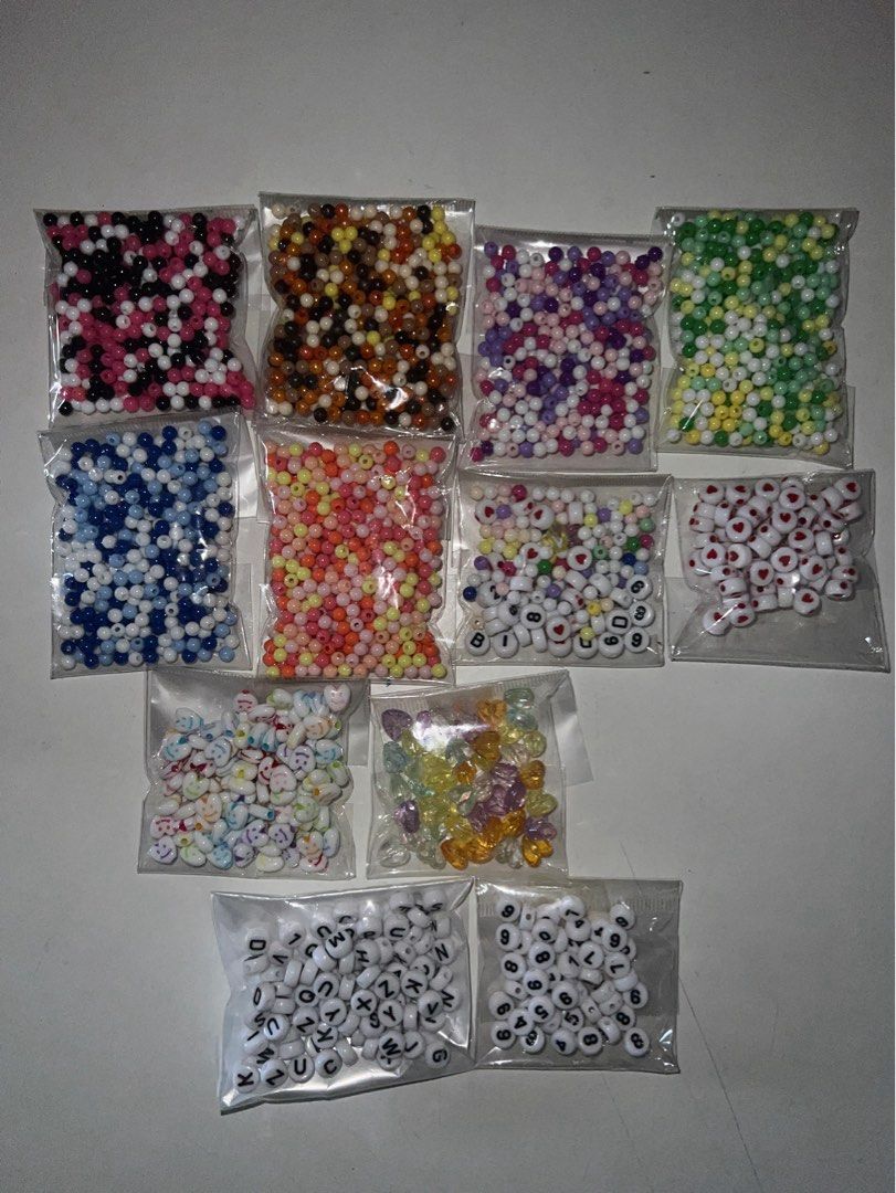 assorted beads (Category: Handmade Craft) located in Singapore. Submitted by frolics (Listing ID 1290732470, Image 1). Description: as shown in pictures most vowels and some letters are used up, limited alphabet and number beads left in the pack $4 per packet TAKE ALL 12 packs for $20 with free mail (tracked) nm +$2 .