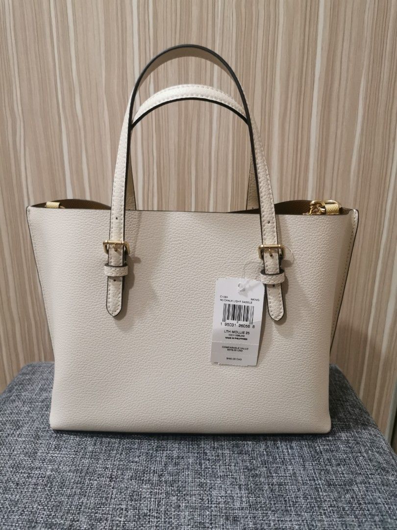 Coach Mollie 25 (Category: Luxury Bags & Wallets) located in Manila. Submitted by goods4all (Listing ID 1294205196, Image 2). Description: Chalk color. Purchased from US Coach outlet. RFS : wrong purchase, wanted the willow tote.