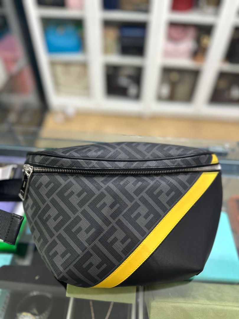 Fendi Men’s Diagonal Gray Belt Bag (Category: Luxury Bags & Wallets) located in Taguig. Submitted by closetcompany (Listing ID 1294133203, Image 1). Description: Fendi Men’s Diagonal Gray Belt Bag 🫧Php 76,000 🫧CONDITION: Excellent condition with small rubs on one corner, hairline scratches on the metal hardware and minimal signs of usage inside. 🫧RATING: 9.3/10 🫧INCLUSIONS: dust bag, box, care card, information card and Legit Grails certifica