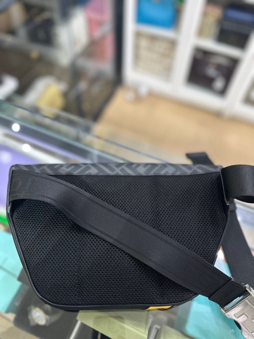 Fendi Men’s Diagonal Gray Belt Bag (Category: Luxury Bags & Wallets) located in Taguig. Submitted by closetcompany (Listing ID 1294133203, Image 3). Description: Fendi Men’s Diagonal Gray Belt Bag 🫧Php 76,000 🫧CONDITION: Excellent condition with small rubs on one corner, hairline scratches on the metal hardware and minimal signs of usage inside. 🫧RATING: 9.3/10 🫧INCLUSIONS: dust bag, box, care card, information card and Legit Grails certifica