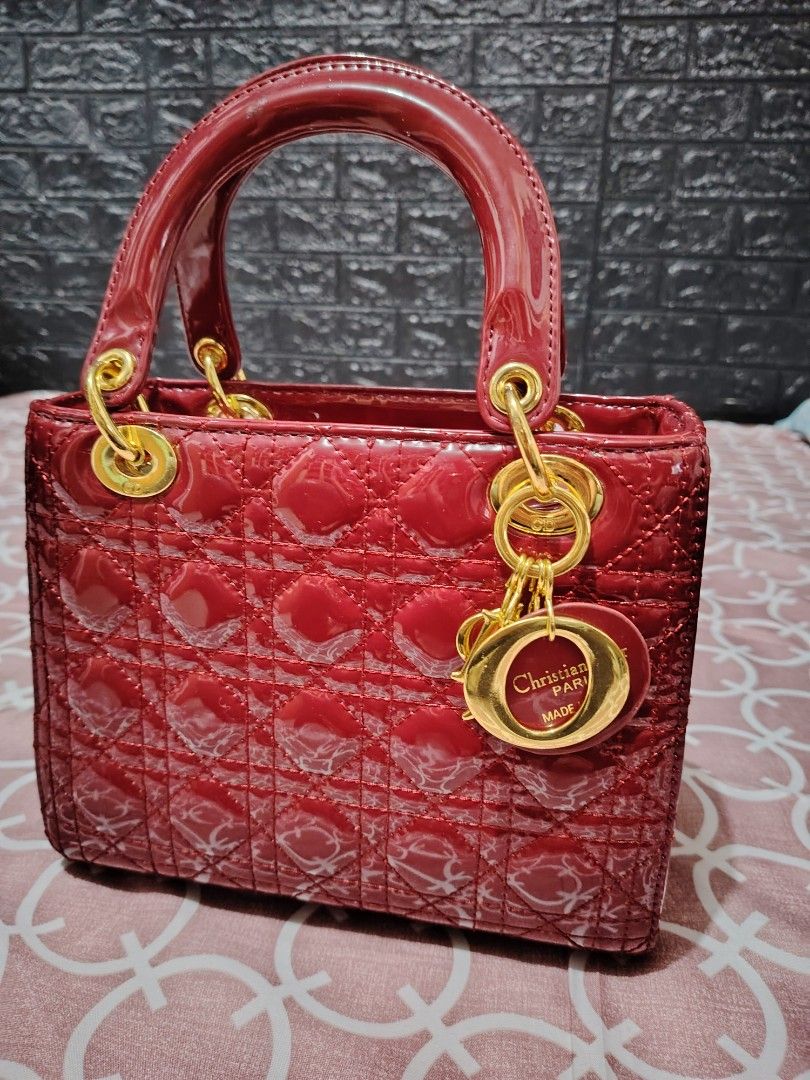 Lady Dior Patent leather 20cm (Category: Luxury Bags & Wallets) located in Cavite. Submitted by awesome0022 (Listing ID 1294254118, Image 1). Description: Selling this pre loved lady dior red patent leather in 20 cm. Bag is nice and comes with a generic dustbag only. Gold hardwares and no tarnish Price is 5.5k Once purchased, no return, no refunds and no exchange..