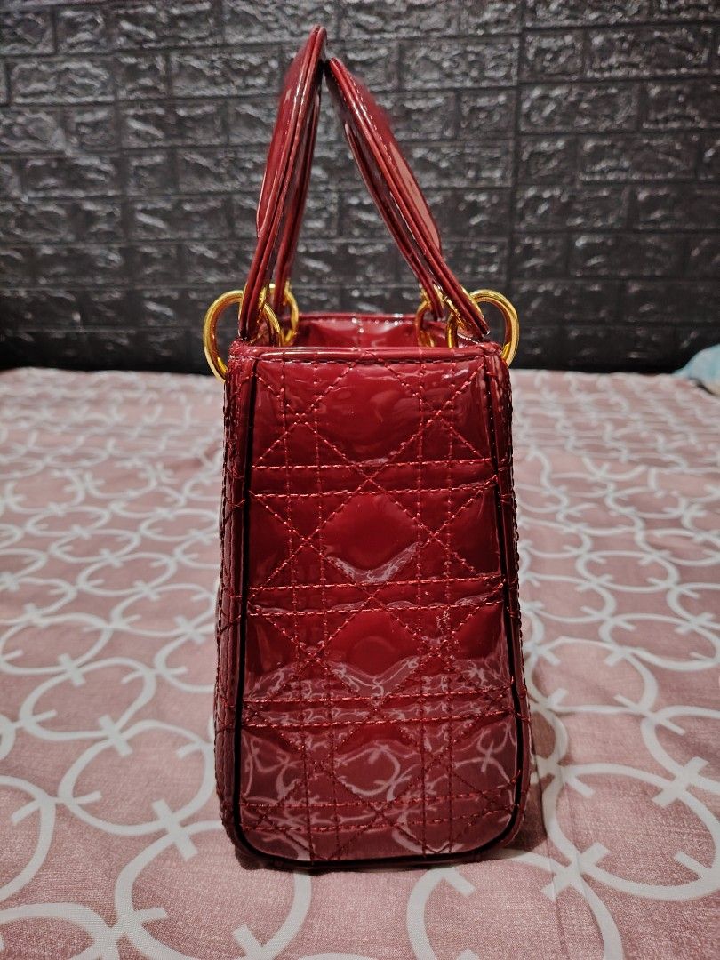 Lady Dior Patent leather 20cm (Category: Luxury Bags & Wallets) located in Cavite. Submitted by awesome0022 (Listing ID 1294254118, Image 3). Description: Selling this pre loved lady dior red patent leather in 20 cm. Bag is nice and comes with a generic dustbag only. Gold hardwares and no tarnish Price is 5.5k Once purchased, no return, no refunds and no exchange..