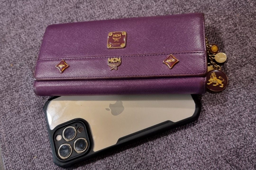MCM Lioness tri fold long wallet Original (Category: Luxury Bags & Wallets) located in Makati City. Submitted by lilyignacio81 (Listing ID 1294274347, Image 3). Description: personal collection BTS ARMY Enter the realm of luxury and sophistication with the MCM Lioness Tri-Fold Long Wallet – an original masterpiece that exudes elegance and exclusivity. Crafted with precision and attention to detail, this wallet isn't just an accessory; it's a symb