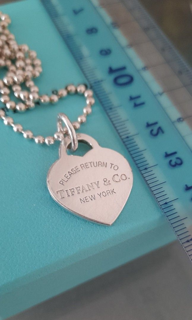 Return to Tiffany® small heart tag in sterling silver on a bead necklace.