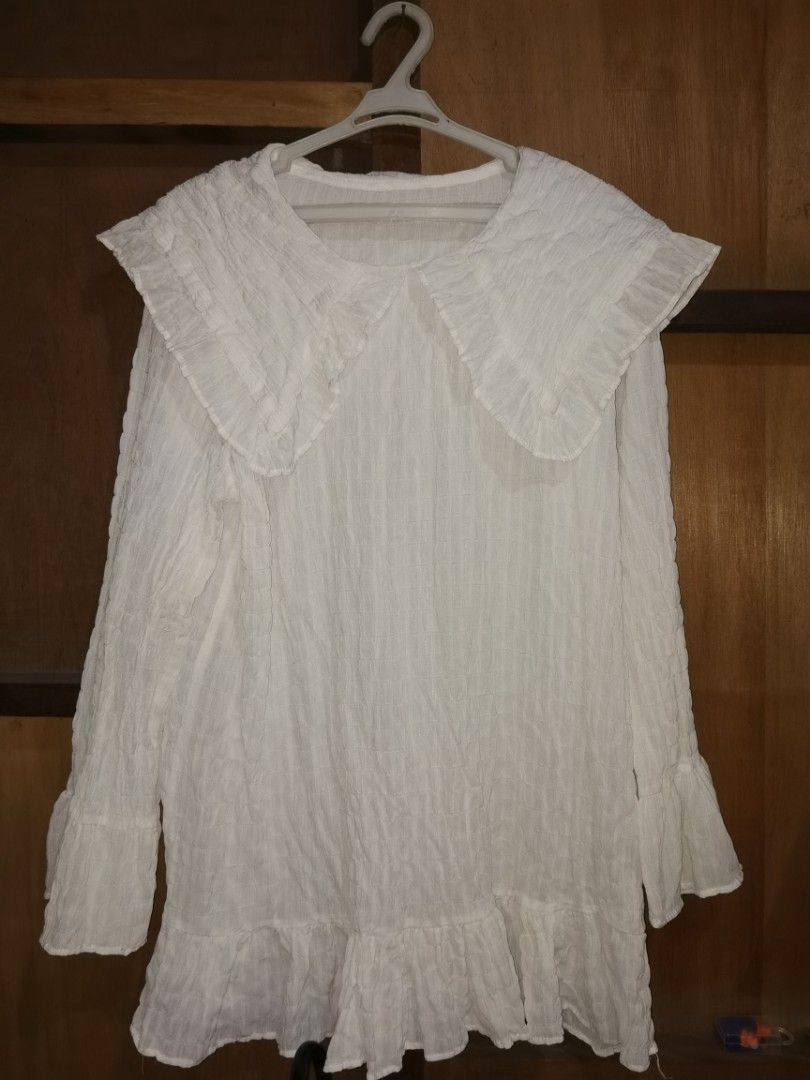 White ethereal blouse with wide collars (Category: Blouses) located in Paranaque City. Submitted by plussizedec (Listing ID 1294192461, Image 1). Description: Bought in Baguio. RFS:Decluttering Items are personal owned items. Used but not abused. Some don't fit anymore, others I have outgrown the style..