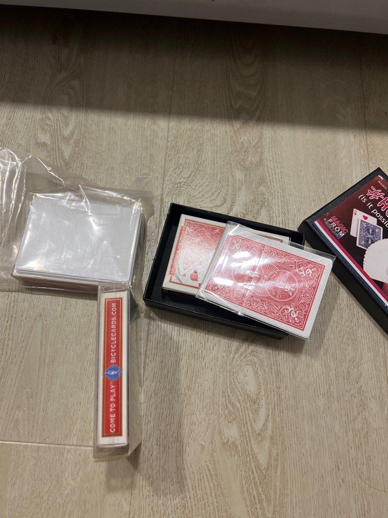 Card tricks bundle (Category: Interactive Toys) located in Singapore. Submitted by magictrickssg (Listing ID 1294437583, Image 2). Description: Alpha deck - Richard sanders ( $30 ) #HOW is it possible - magic from holland ($16) ICaan - James went ( $20 ) All 3 for $50 Comes with online instructions and red bicycle deck gimmicks .