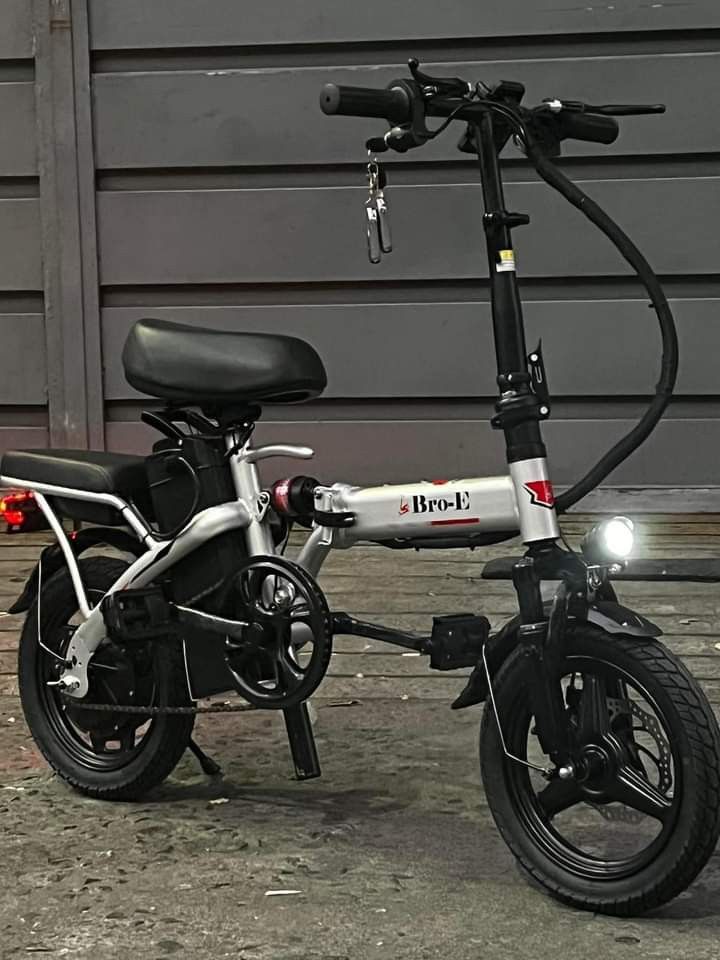 E 14 folding ebike (Category: Bicycles) located in Manila. Submitted by minidivisoria (Listing ID 1294309984, Image 1). Description: Folding electric bike #E-14 Scooter Tire:14*2.125 in Rubber tires Battery Capacity: 48V 10.4ah Mileage Electric range (km): 35km; PAS range (km): 80km Motor Power: 250W Brushless Motor Top Speed: Electric speed (km/h): 20-25km/h; Assist speed (km/h): 15km/h Maximum load 100KG Applicable height 122-175cm.