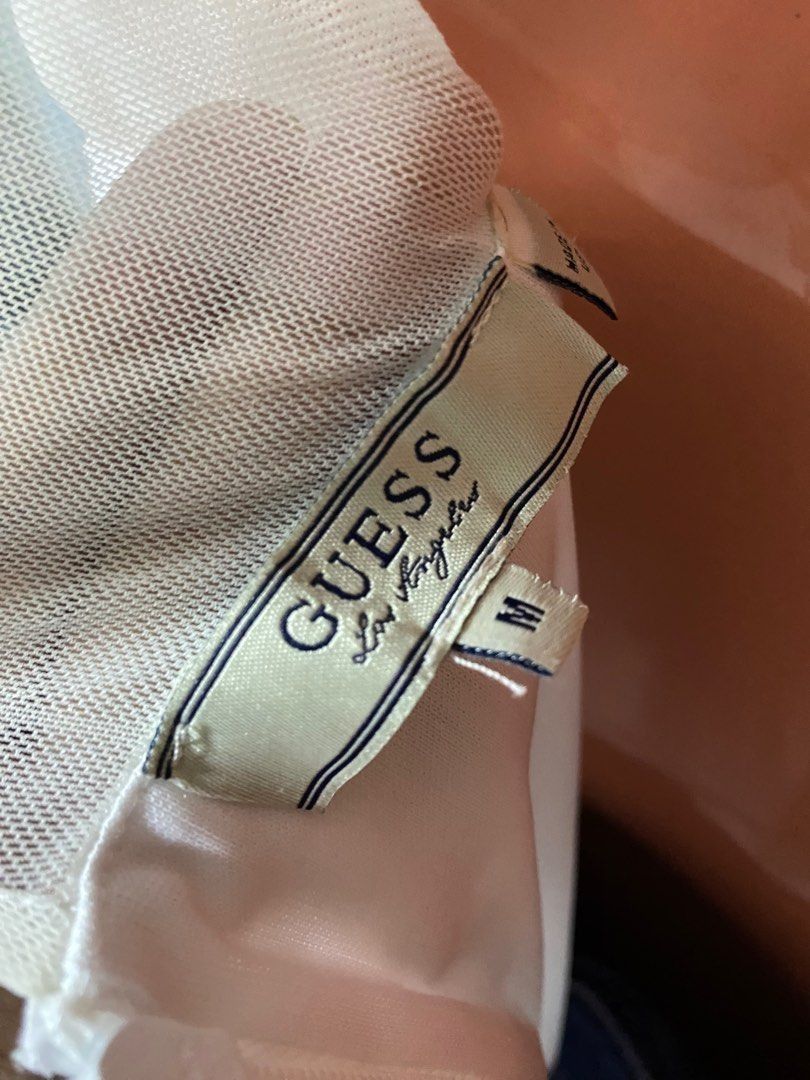 Guess White Skater Dress (Category: Dresses) located in Asingan. Submitted by apple_daisy (Listing ID 1294312972, Image 3). Description: Length: 34.5 inches.
