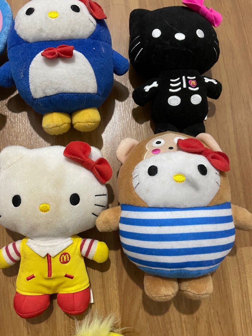 Hello kitty clown plush sales