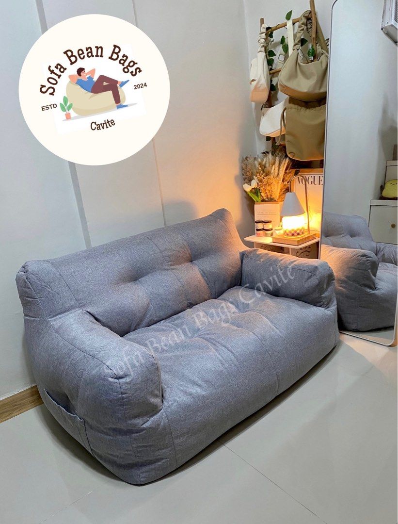 Light Gray Mini Bean Bag Sofa 2-Seater (Category: Other Home Furniture) located in Cavite. Submitted by yasiixoxo (Listing ID 1294329388, Image 1). Description: Try out our newest item.. The MINI BEAN BAG SOFA✨💫 ..in the color Light Gray! Perfect for your small spaces such as bedroom, apartments, dormitory and etc. Made from High Quality Cotton Linen with inner fillings included. Our Mini Bean Bag Sofa can fit 1-2 persons, perfect for adults, al