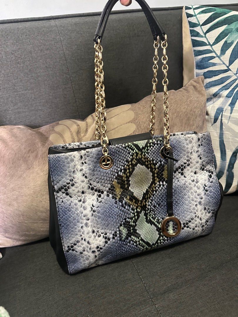 Orton Shoulder Bag (Category: Luxury Bags & Wallets) located in San Juan City. Submitted by vmdln (Listing ID 1294340005, Image 1). Description: Like new condition Gold hardware Phyton Leather Design .