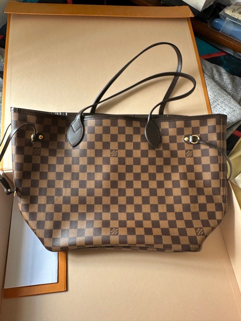 Authentic Louis Vuitton Neverfull MM Ebene (Category: Luxury Bags & Wallets) located in Manila. Submitted by themeowski (Listing ID 1294463530, Image 1). Description: Like New With box.