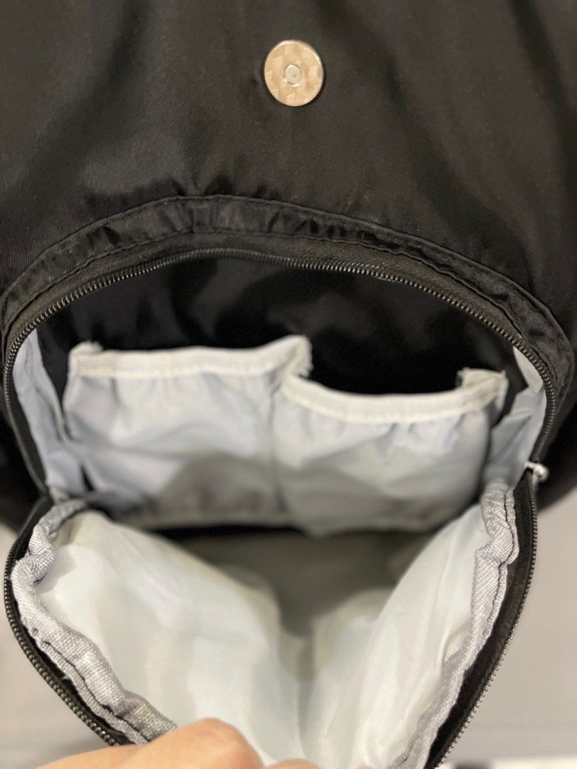 Backpack (Category: Diaper Bags & Wetbags) located in Singapore. Submitted by shknshkr (Listing ID 1294448808, Image 3). Description: Still in good condition. Total of 11 compartments. Can fit 3 bottles, 10 diapers, 1 wet wipes, and other small bottles like body shower, sanitizers etc. Self collect at Sembawang. .