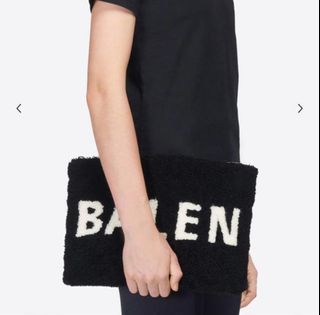 Balenciaga logo mouton clutch bag leather