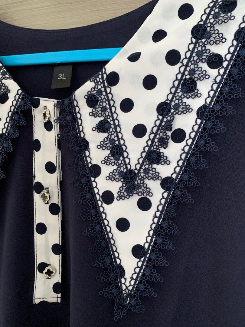 Blouse (Category: Blouses) located in Singapore. Submitted by secondlovexoxo (Listing ID 1294497759, Image 3). Description: Polka dots sleeves in chiffon Navy blue in cotton Brand new never washed never worn but no tag (never have tag) .