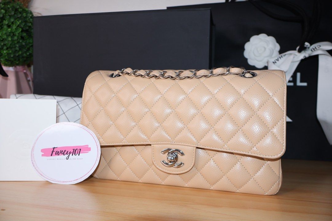 Chanel Double Flap Beige Claire Caviar (Category: Luxury Bags & Wallets) located in Caloocan City. Submitted by thefancy101luxurymanila (Listing ID 1294613106, Image 1). Description: Chanel Double Flap Beige Claire Caviar ✅ Guaranteed authentic 💯 ✅ Brand new. Rank SA ✅ silver hardware ✅ Medium size caviar in beige claire ✅ Microchipped year of purchase: 2023 ✅ Comes in complete inclusions. Box, Paper bag, Dust bag, cloth, certificate of purchase
