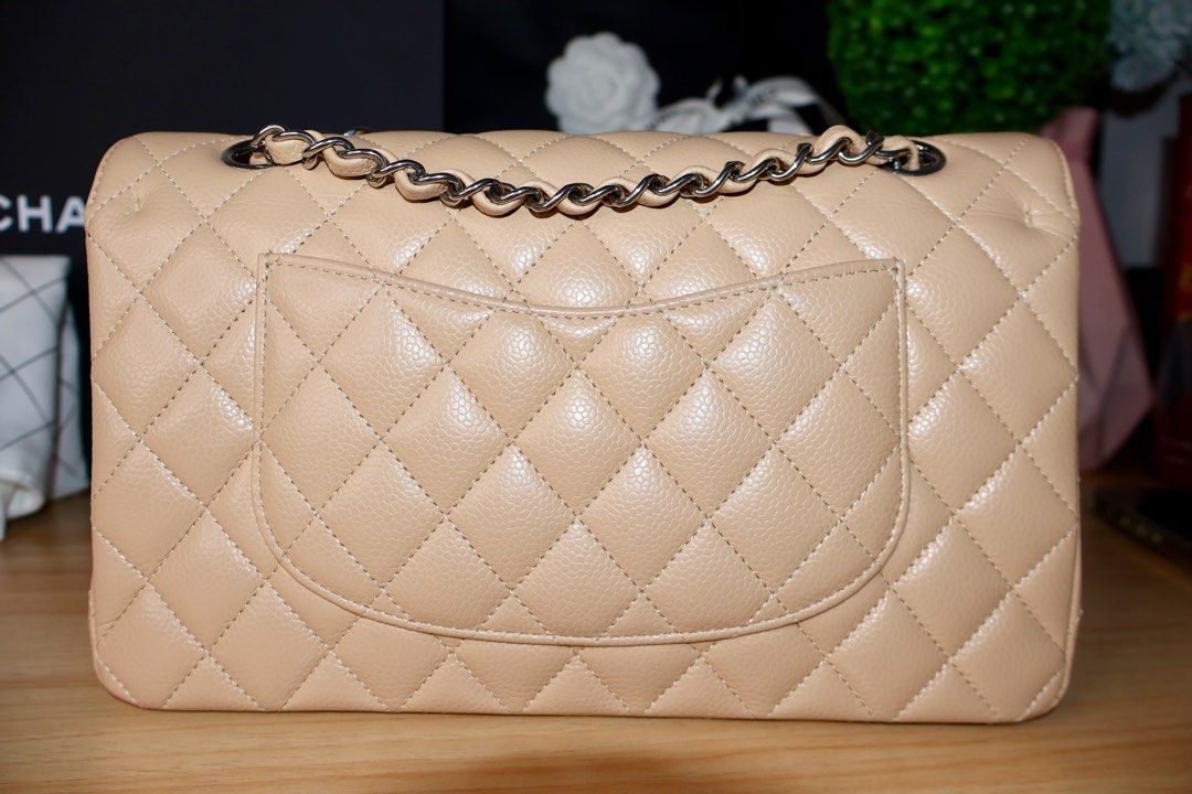Chanel Double Flap Beige Claire Caviar (Category: Luxury Bags & Wallets) located in Caloocan City. Submitted by thefancy101luxurymanila (Listing ID 1294613106, Image 3). Description: Chanel Double Flap Beige Claire Caviar ✅ Guaranteed authentic 💯 ✅ Brand new. Rank SA ✅ silver hardware ✅ Medium size caviar in beige claire ✅ Microchipped year of purchase: 2023 ✅ Comes in complete inclusions. Box, Paper bag, Dust bag, cloth, certificate of purchase