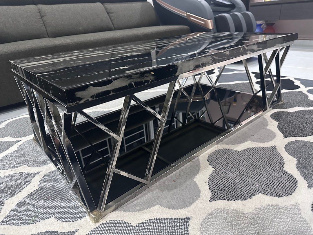 Coffee Table (Category: Tables & Sets) located in Singapore. Submitted by mnrynhf (Listing ID 1294488928, Image 2). Description: Stainless steel frame 100% Marble top, detachable Original price $500, Selling at $150 Negotiate down to $100 Width - 65cm Length - 120 cm Height - 48cm Self pick up at tampines.