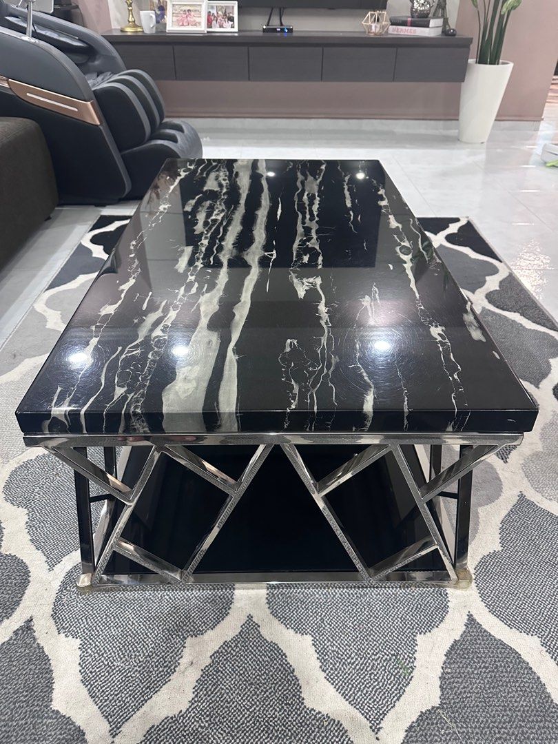 Coffee Table (Category: Tables & Sets) located in Singapore. Submitted by mnrynhf (Listing ID 1294488928, Image 3). Description: Stainless steel frame 100% Marble top, detachable Original price $500, Selling at $150 Negotiate down to $100 Width - 65cm Length - 120 cm Height - 48cm Self pick up at tampines.