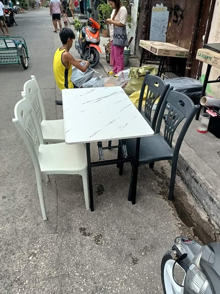 Foldable table and chairs good quality cash on delivery💯 (Category: Tables & Sets) located in Quezon City. Submitted by joycemanahan (Listing ID 1294448988, Image 3). Description: ‼️ ON HAND‼️ FOLDABLE TABLE WITH HAMPAS CHAIR SET💥💥💥 ✅️ PWDE PANG DINING ✅️ PWDE PANG BUSSINESS/ RESTAURANT/PARESAN/MILKTEA AT IBA PA ✅️ MATIBAY NA TABLE AT UPUAN KAHIT IBALIBAG NAPAKA ELASTIC COLORS AVAILABLE💥💥💥 WHITE MARBLE📌BLACK MARBLE📌 PLAIN BLACK📌 YELLOW 