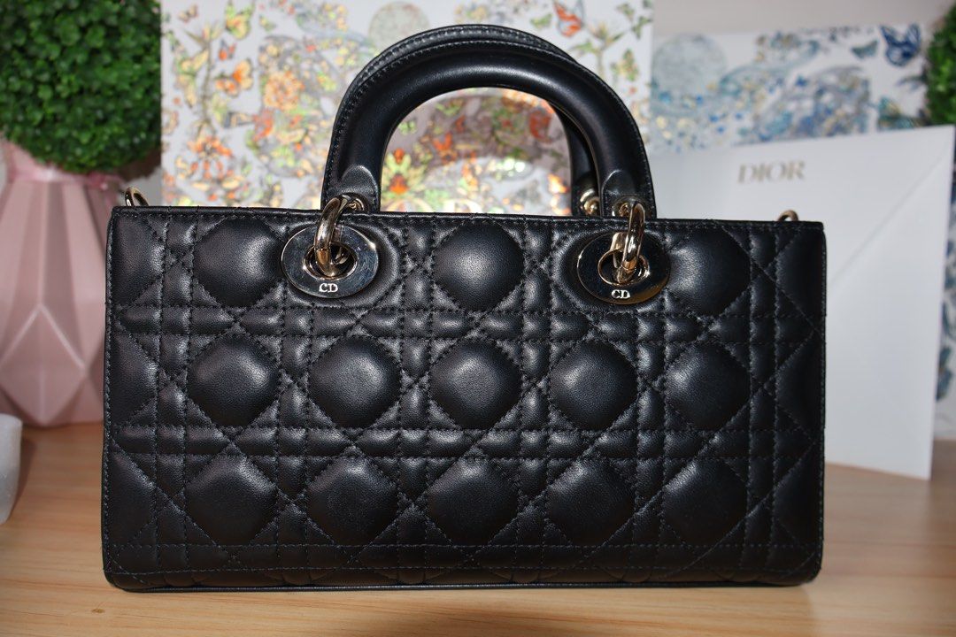 Lady D Joy GHW in Medium Black (Category: Luxury Bags & Wallets) located in Caloocan City. Submitted by thefancy101luxurymanila (Listing ID 1294590690, Image 2). Description: Lady D Joy GHW in Medium Black ✅ Brand new / Rank SA ✅ Complete inclusion. Comes with Box, Dust bag, care card, cross body strap, shoulder strap and paper bag ✅ ₱325,000 srp in Dior Greenbelt ✅ Selling for ₱280,000 only ✅ Date code 88-MA-1213 ✅ Cash or Bank Transfer only.
