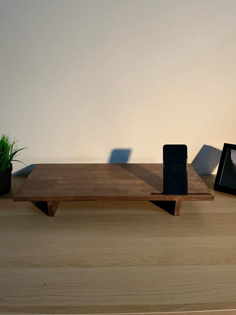 Monitor Riser Stand - Mini (Category: Desktops) located in Kuala Lumpur. Submitted by muraiwoodworks (Listing ID 1289143135, Image 2). Description: - Ready stock - Handmade - Solid Rubberwood - Dimensions : 60cm x 25cm x 7cm - Built in phone holder (right hand side) - Available in Natural and Mahogany finishes * Custom sizing is available, If you want SMALLER than this size there will be NO ADDITIONAL CHARGES. However if you want BIGGER/LONGER th