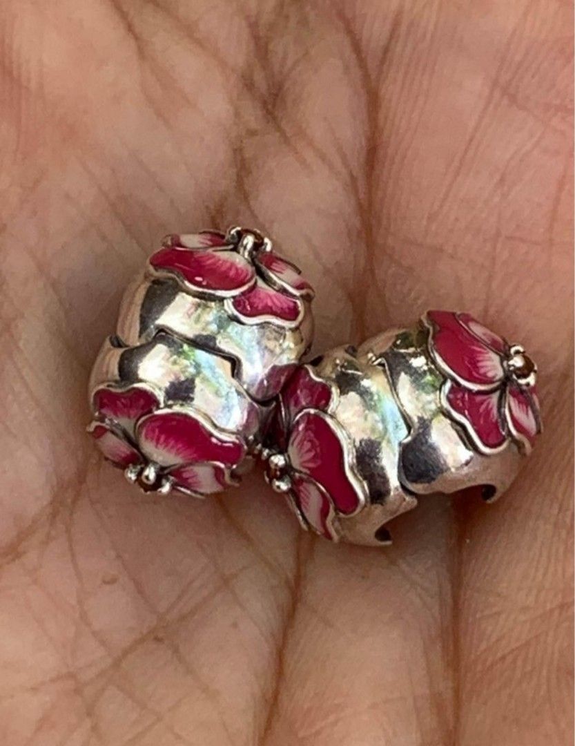 Pandora Pansy Flower Clip Charm Pair (Category: Bracelets) located in Cainta. Submitted by cookie8186 (Listing ID 1294616630, Image 2). Description: Authentic. See markings, can be cleaned to any Pandora store. Very good condition, barely used. Price for pair. Selling in pairs only. gcash/lalamove j&t. Can be pick-up at Parang Marikina..