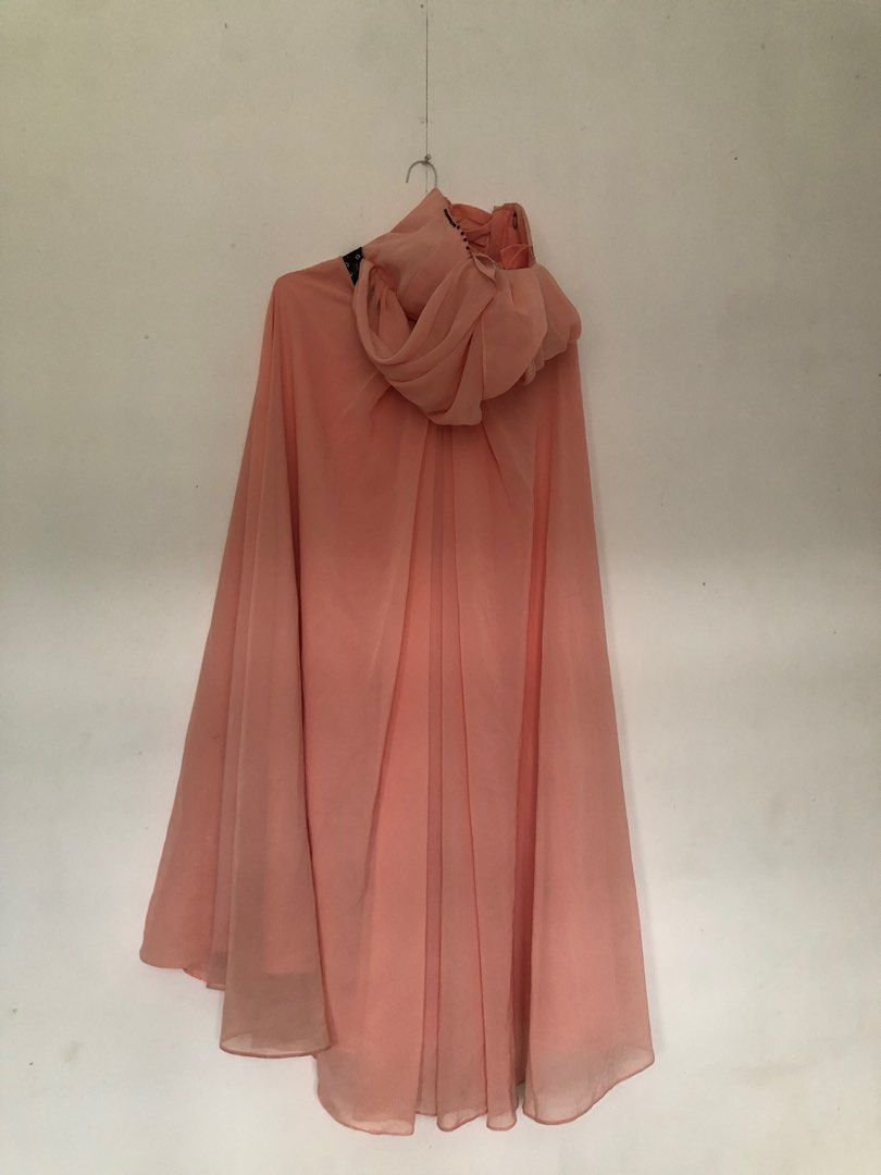 Peach / coral flowy dress (Category: Evening dresses & gowns) located in Quezon City. Submitted by tuurtelle (Listing ID 1294535636, Image 2). Description: Ginamit lang pang abay Once lang ginamit XS - medium Adjustable yung likod Bought this for 1500+.