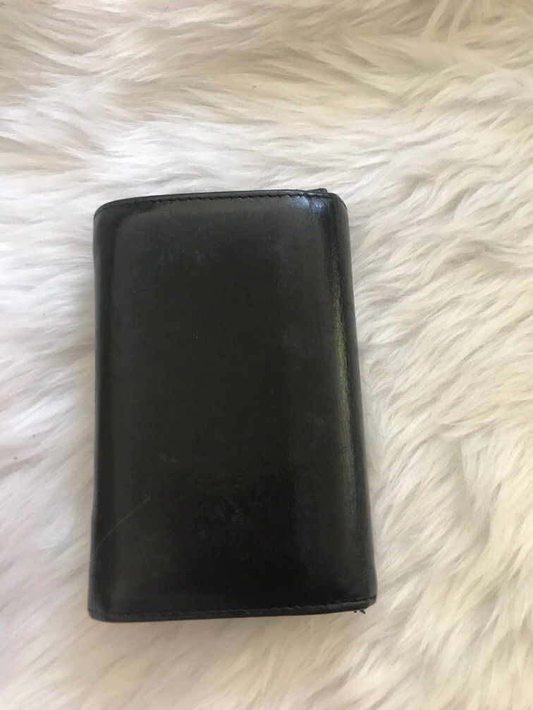prada card holder (Category: Luxury Bags & Wallets) located in Antipolo. Submitted by prelovedcloseta (Listing ID 1294452572, Image 2). Description: auth prada card holder can fit 10 - 12 cards preloved with minor signs of usage .