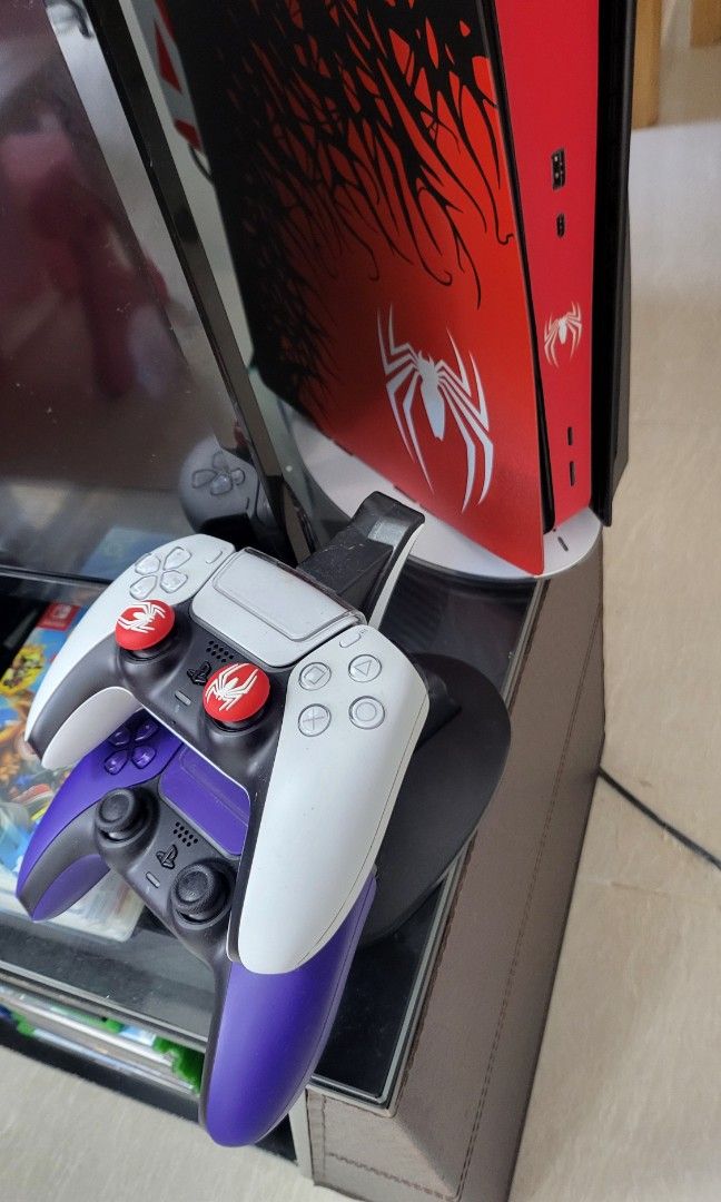 Ps5 Disk version (Category: PlayStation) located in Singapore. Submitted by kurao (Listing ID 1294547031, Image 3). Description: Slightly use only with games and 2 controllers. with 13 games The unit is Premod you can see in the photo..