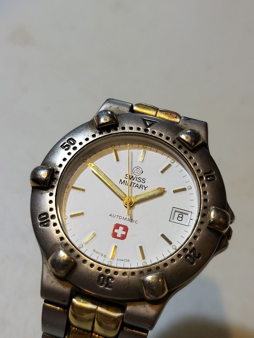 Swiss Military White Dial Automatic Watch (Category: Men's Watches) located in Iloilo. Submitted by KCY_Timepieces (Listing ID 1294512251, Image 2). Description: Condition: Quickset date not working Model: Swiss Military Material: Stainless Steel Color: White Bracelet: Swiss Military up to 6.5in Wrist Size: 37mm Inclusions: none *********************************************** MOP: COD/COP, Bank Transfer, Gcash, 3 months 0% for BDO Credit Card hol