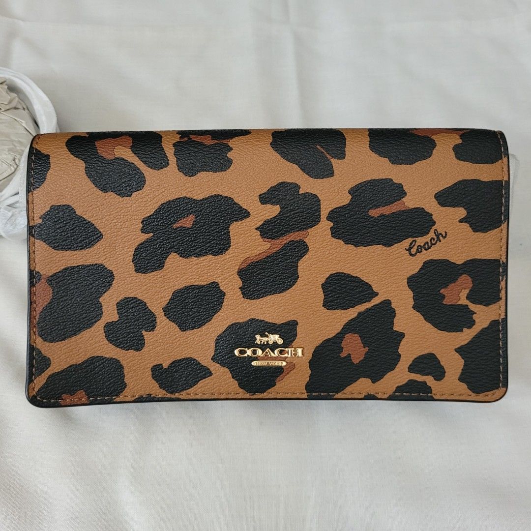 Coach leopard clutch hotsell