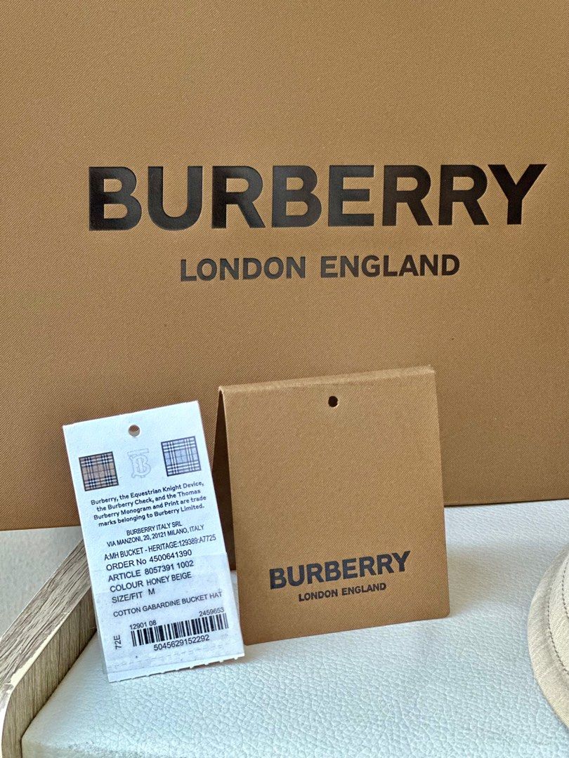BURBERRY belted bucket hat (Category: Luxury Accessories) located in Quezon City. Submitted by jquimmyy (Listing ID 1294734109, Image 2). Description: Burberry belted bucket hat for sale 🤍 Used once only! Size M Cotton 100%, Leather 100% Complete inclusion — paper bag, ribbon, plastic bag, tags. It was given to me as a gift thus no receipt .
