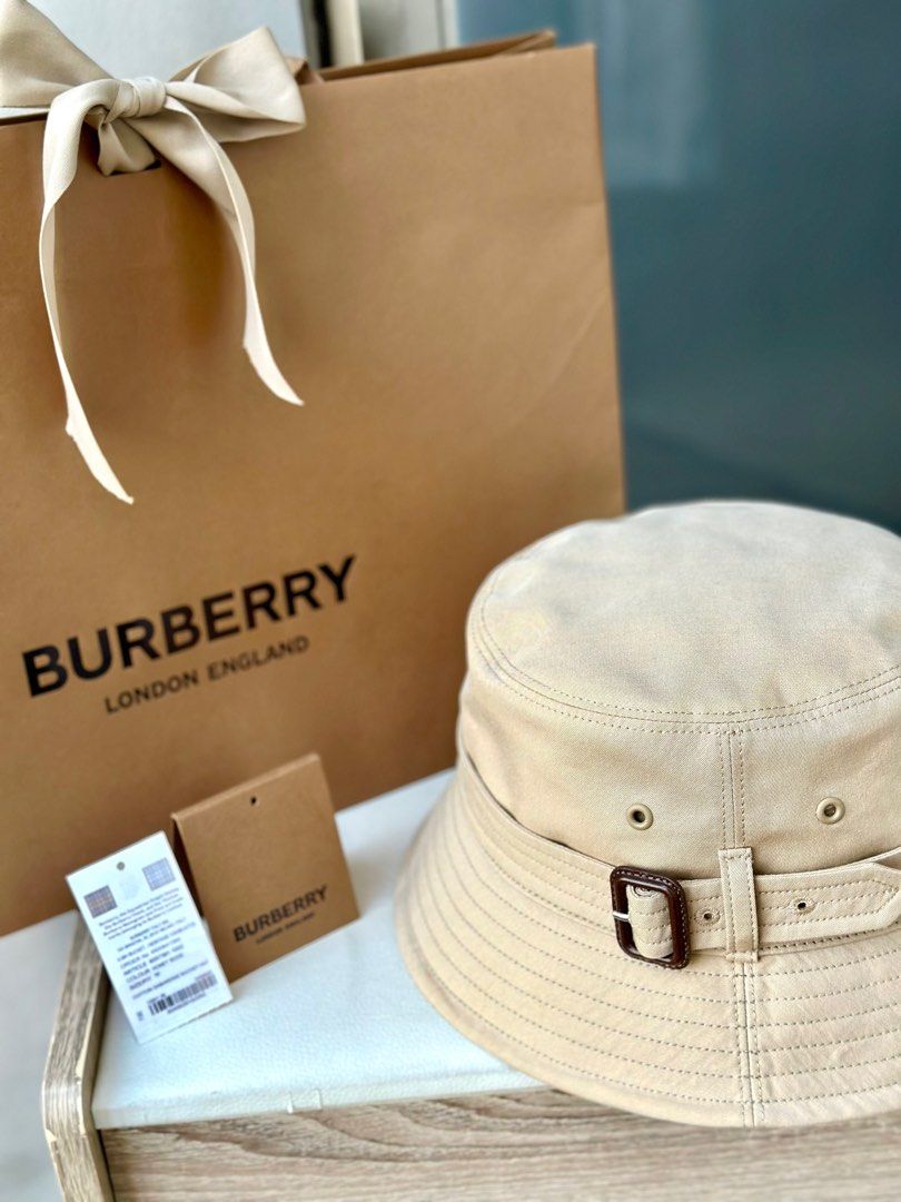 BURBERRY belted bucket hat (Category: Luxury Accessories) located in Quezon City. Submitted by jquimmyy (Listing ID 1294734109, Image 3). Description: Burberry belted bucket hat for sale 🤍 Used once only! Size M Cotton 100%, Leather 100% Complete inclusion — paper bag, ribbon, plastic bag, tags. It was given to me as a gift thus no receipt .
