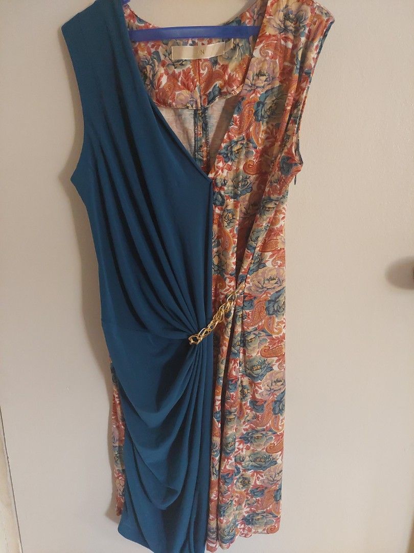 CLN bluegreen overlap dress (Category: Dresses) located in Kawit. Submitted by japhem_20 (Listing ID 1294649292, Image 1). Description: CLN dress overlap gold waist bangle zip on the side for only php 500.
