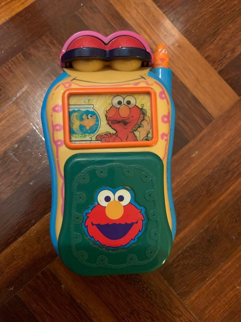 Elmo music phone (Category: Infant Playtime) located in Petaling Jaya. Submitted by tanst123 (Listing ID 1294665100, Image 1). Description: Baby presses Elmo’s phone for music & words..