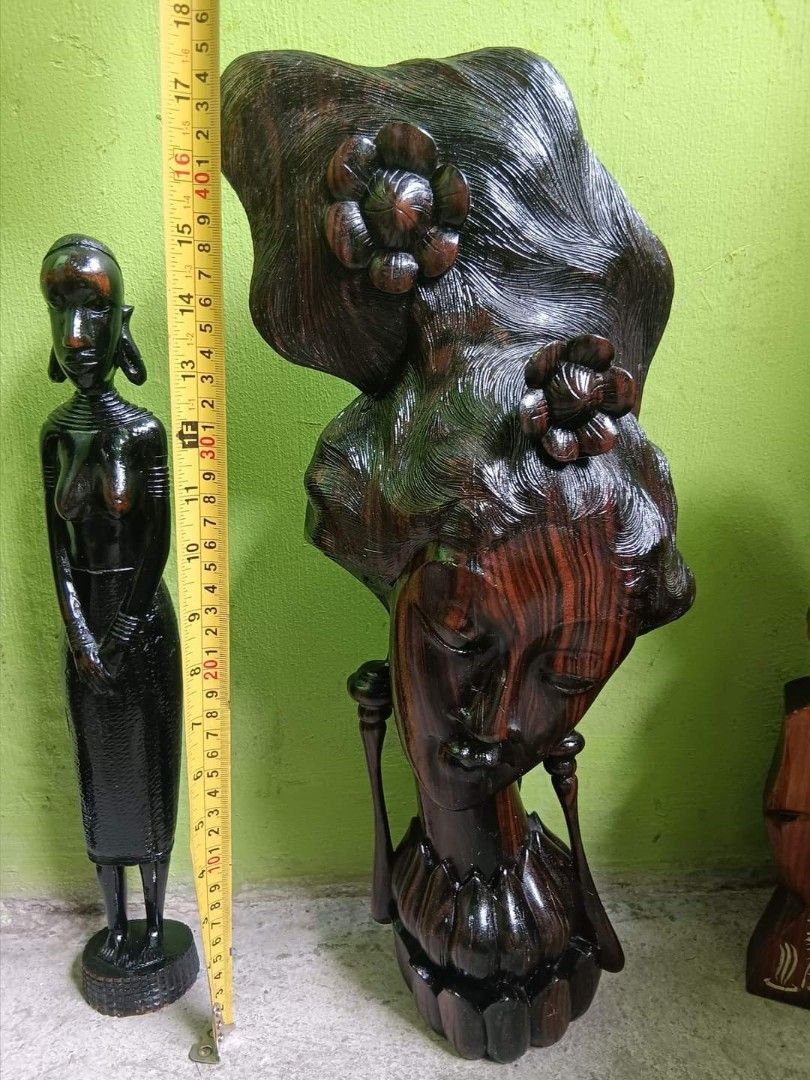 Iron wood Sculpture (Category: Other Home Decor) located in Muntinlupa City. Submitted by gabbyboy1119278 (Listing ID 1294731500, Image 1). Description: FS: This very heavy banded Ironwood sculpture is in very good condition and is so heavy it feels like a bronze when you pick it up. Very elegant and exotic with a high head dress..