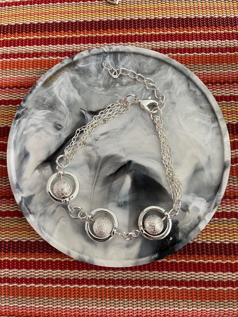 Silver bracelets (Category: Bracelets) located in Singapore. Submitted by rambutanseed1111 (Listing ID 1294687926, Image 2). Description: Silver bracelets for small wrists. SGD12 each. .