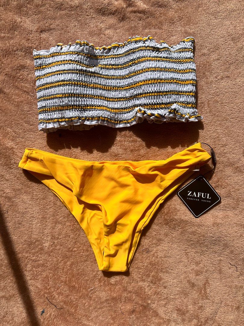 Yellow Bandeau Swimsuit (Category: Bikinis & Swimsuits) located in Makati City. Submitted by linya.ph (Listing ID 1294673802, Image 2). Description: Size - Medium Brand - zaful Condition - Brandnew With Pouch Buy 4, get 1 swimsuit FREE!.