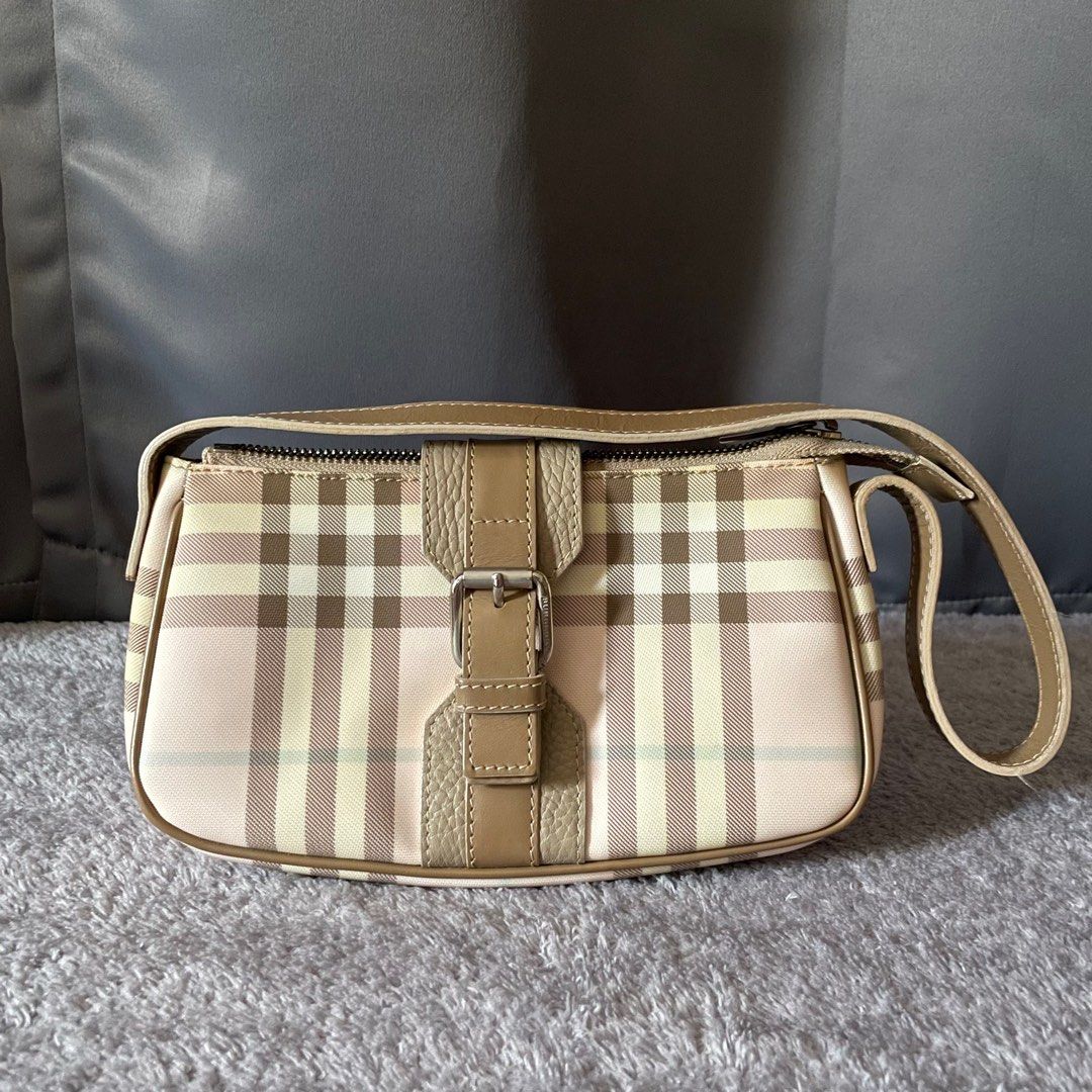 Burberry Pink Nova Check Pochette (Category: Luxury Bags & Wallets) located in Makati City. Submitted by lalala1621 (Listing ID 1295006176, Image 1). Description: Rank: AB Inclusions: dust bag and tag.