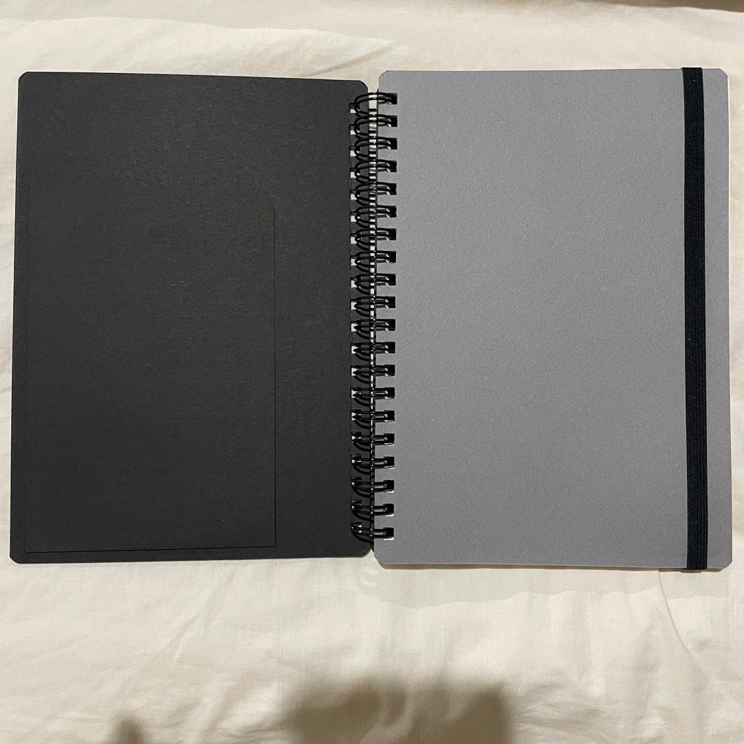 Muji Notebook and Pens (selling as set) (Category: Stationery & School Supplies) located in Cagayan de Oro. Submitted by heyco.ph (Listing ID 1294983642, Image 3). Description: (1) Ruled Ring Notebook w/ Elastic Band - 80 sheets | black | ruled | B6 (2) Ballpoint Pen Cap-type Body - white (body ONLY; NO ink inside) (2) Polycarbonate Ballpoint Pen with Rubber Grip - 0.7mm | black ⋆ Original Muji items ⋆ get the notebook, 2 pens, and 2 pen-body for