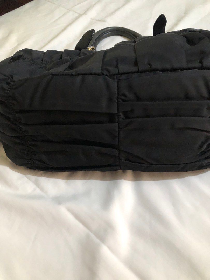 Sale!Authentic Bag nylon gaufre (Category: Luxury Bags & Wallets) located in Mandaluyong City. Submitted by bmorig (Listing ID 1294826864, Image 3). Description: Super low price with long strap with dustbag with box Pls check ther details photos nalang free shipping money back guarantee if proven mo na fake.
