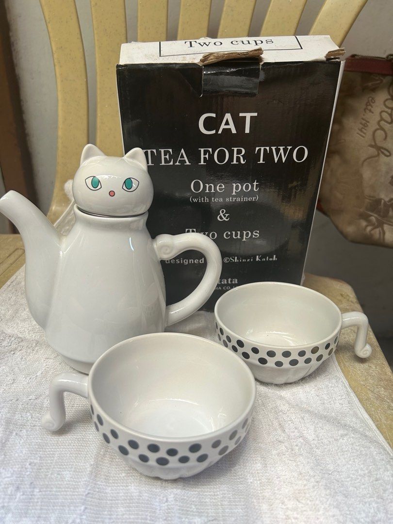 Teapot and mugs (Category: Dinnerware & Cutlery) located in Pasig City. Submitted by herclosetandstuff (Listing ID 1294842244, Image 1). Description: Very cute Japanese made by Shinzi Katoh cat teapot and mugs with stainless filter. I fs decluterring. Bought at P 1,800.