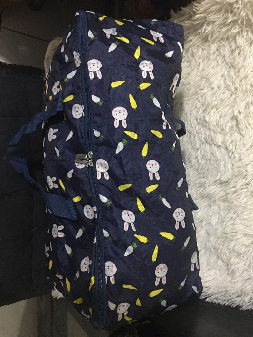 Blue nylon travel bag (Category: Luxury Bags & Wallets) located in Cainta. Submitted by janilen (Listing ID 1295099037, Image 2). Description: 18"x10"x7.5" No flaws. .