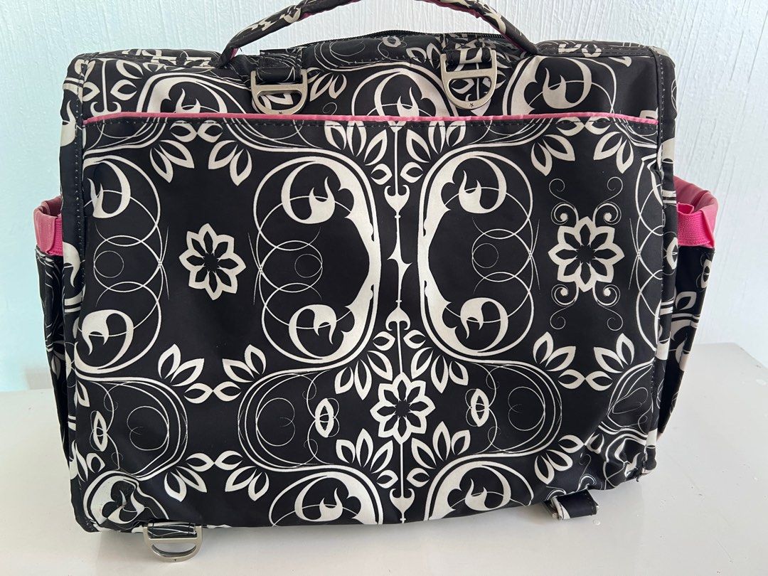 Jujube Diaper Bag (Category: Diaper Bags & Wetbags) located in Amadeo. Submitted by mavmadel (Listing ID 1249809574, Image 2). Description: Jujube diaper Bag -well used -malinis ang loob -sign of usage -needs washing -hindi na gnun ka black ang color -footrest with scrathes - bawal sa maselan pede pang daily use or pang errands .