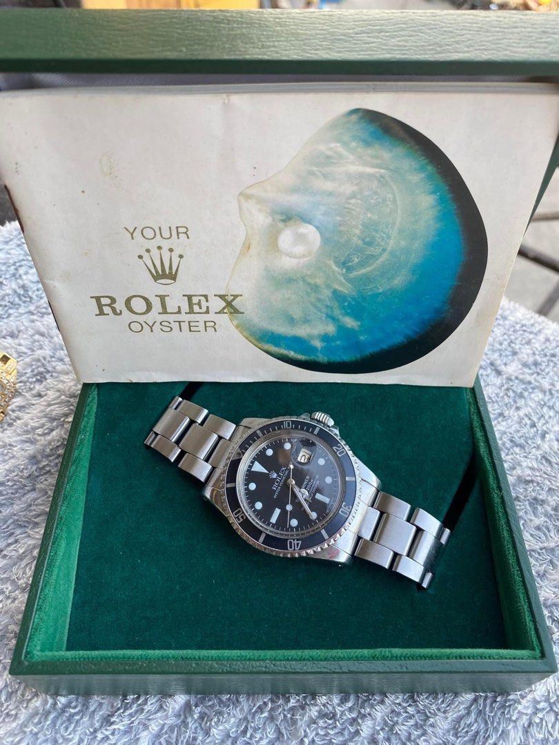 rolex (Category: Luxury Watches) located in Cabanatuan. Submitted by albertgonzales27 (Listing ID 1295016966, Image 3). Description: Rolex Submariner 40mm Case Diameter 1680 Reference no. 1977 Year Model Re Issue Dial Ghost Bezel With Original Box And Manual Only Condition: 9.2/10.